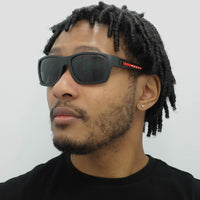 Prada Sport Sunglasses PS01WS DG002G Black Rubber Dark Grey Polarized