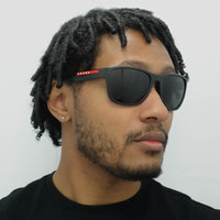 Prada Sport Sunglasses Mens PS01US DG05S0 - Rectangle Black Rubber Frame - Grey Lens