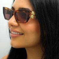 Miu Miu Sunglasses MU09WS 11Q08S Striped Tobacco Dark Violet